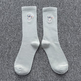 Spring and summer couple socks solid color ins tide embroidery astronaut net red fashion wild tube socks sports tide socks