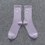 Spring and summer couple socks solid color ins tide embroidery astronaut net red fashion wild tube socks sports tide socks